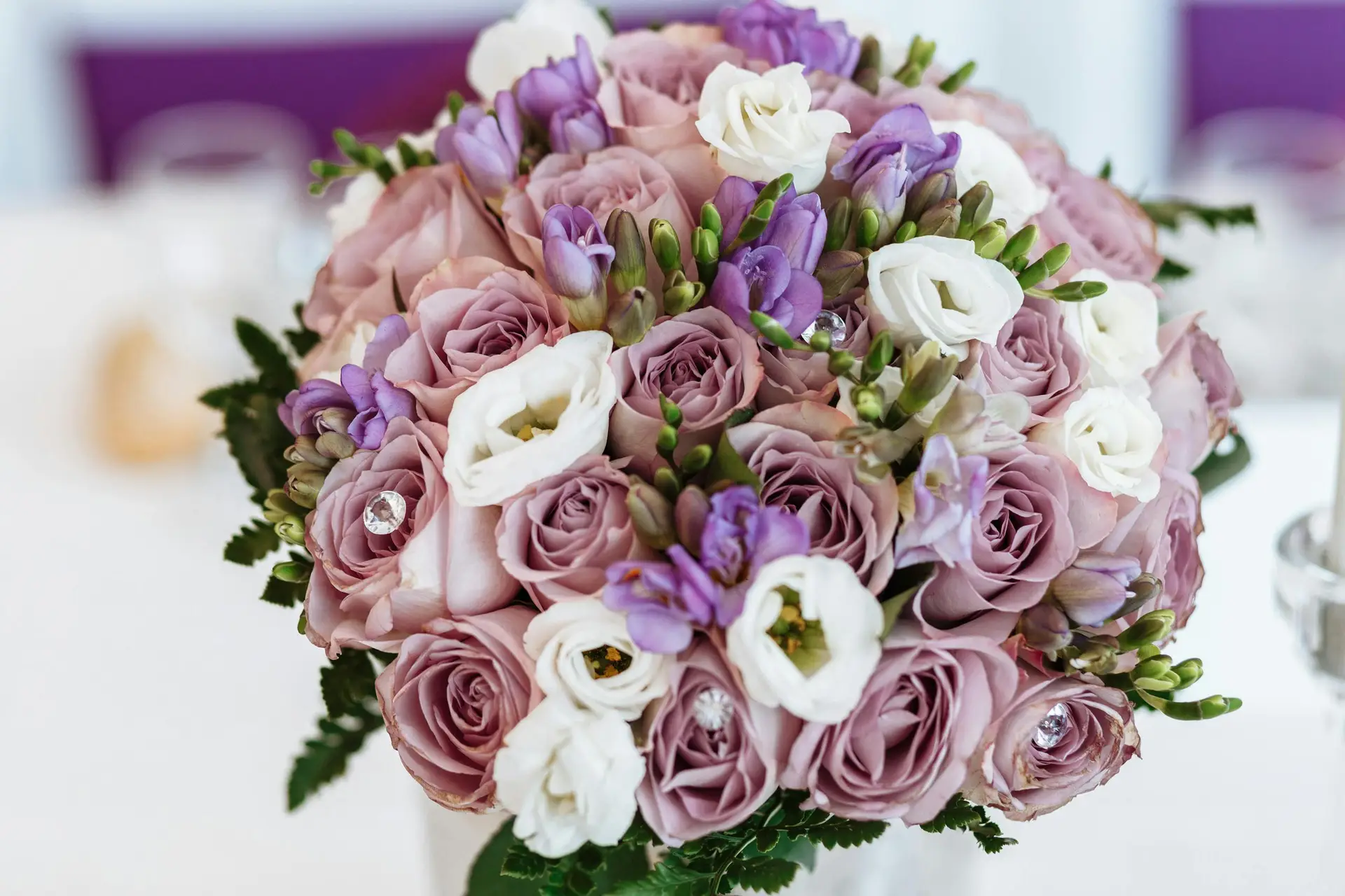Elegant bridal bouquet featuring pastel roses and lisianthus, perfect for weddings and romantic occasions.